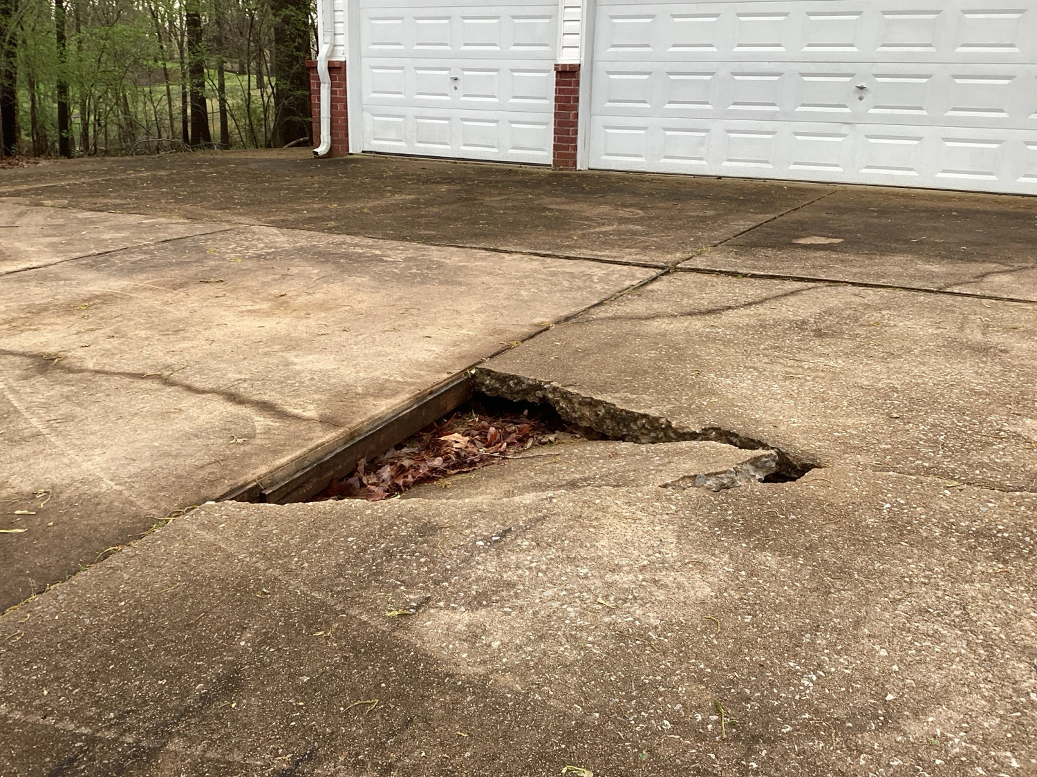 Sinking driveway, walkway, patio